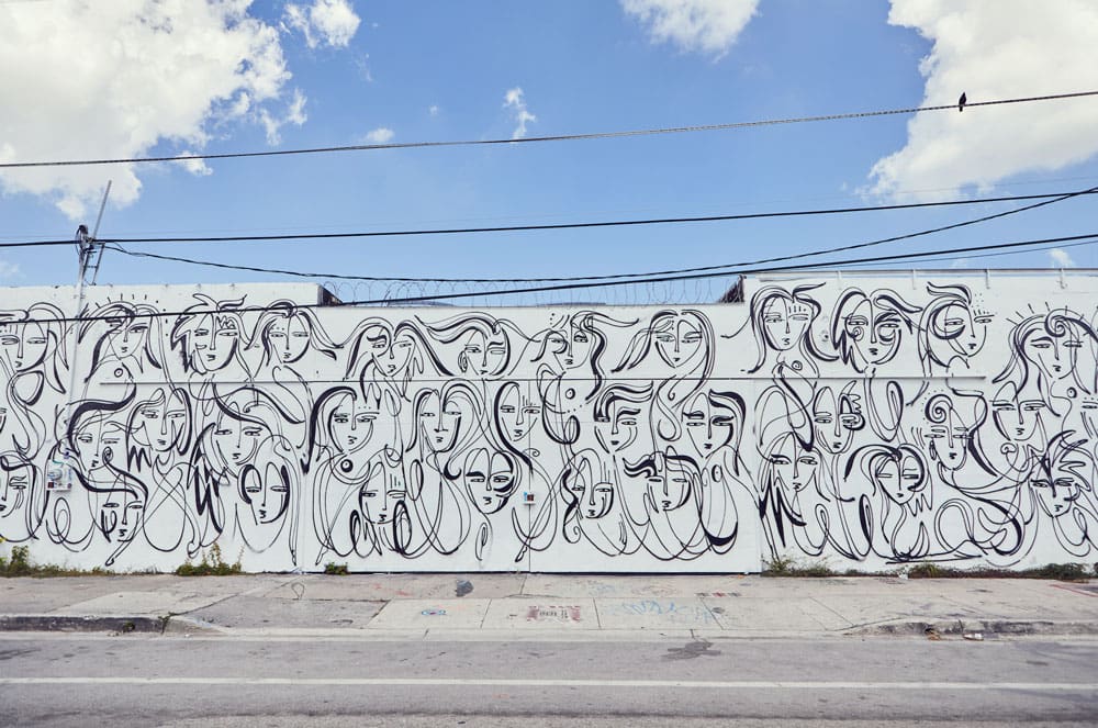 Black and white faces' mural